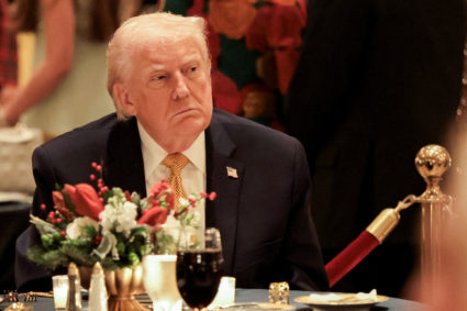 U.S. President Trump takes part in a Christmas Eve dinner in the ballroom of his Mar-a-Lago club in Palm Beach