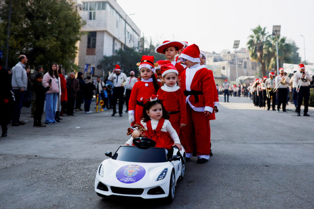 Christmas celebrations at the Church of the Holy Cross in Damascus