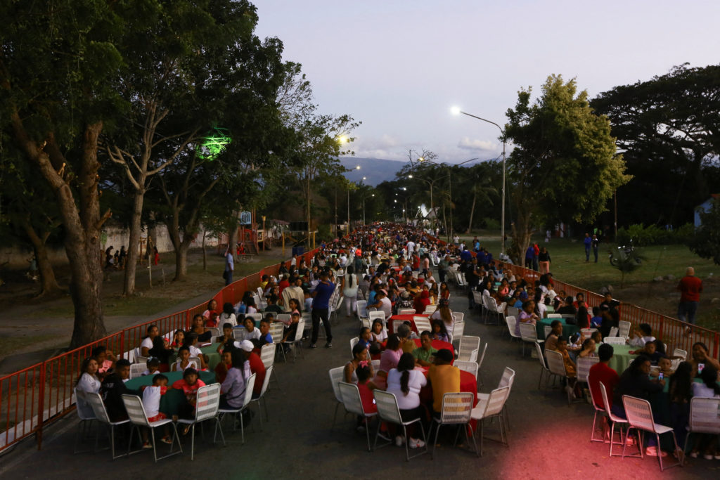 Venezuelans gather for Christmas dinner in Cacarote