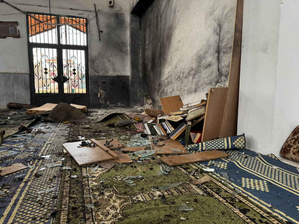 A view shows an interior of a damaged mosque after several people were killed in an explosion at a mosque of the Alawite m...