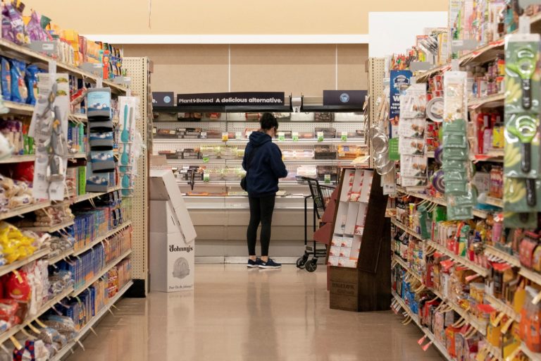 FILE PHOTO: Food shoppers browse the aisles for groceries ahead of the Thanksgiving Day holiday in Redmond