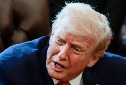 U.S. President Trump signs executive orders at the Oval Office, in Washington