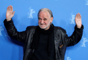 FILE PHOTO: Hungarian director Tarr poses during a photocall for his movie 'A Torinoi Lo' at the 61st Berlinale Internatio...