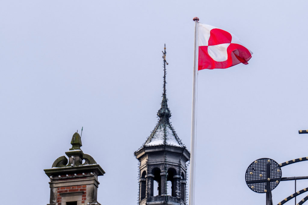The Greenlandic flag, Erfalasorput, waves at the H.C. Andersen Castle, also known as the Tivoli Castle, in Copenhagen