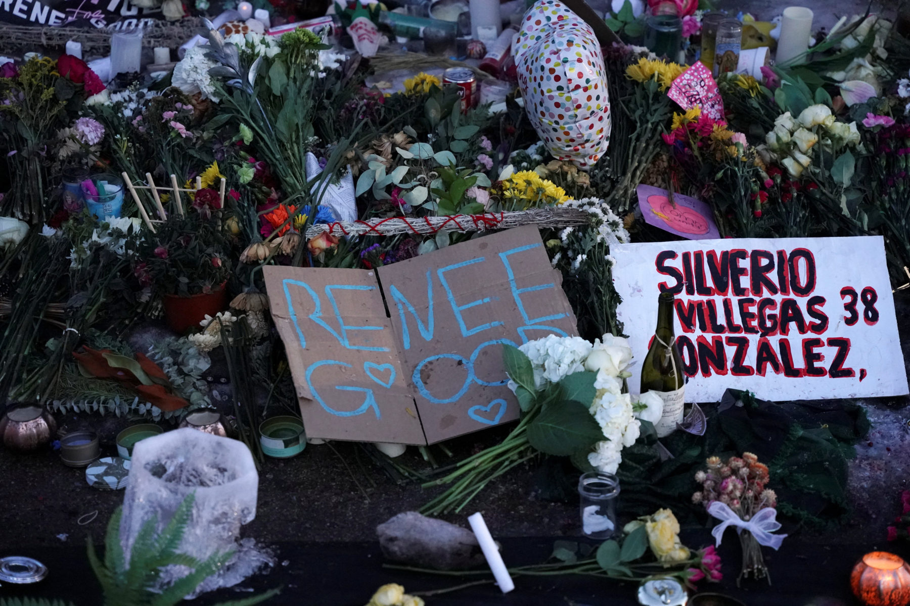Makeshift memorial near the site of the fatal shooting of Renee Nicole Good by a U.S. Immigration and Customs Enforcement ...