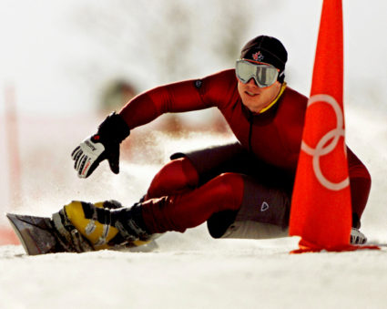 FILE PHOTO: Ryan Wedding of Canada in Olympic snowboard parallel giant slalom practice in 2002
