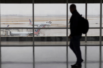 Travellers at Dallas Fort Worth International Airport