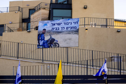 FILE PHOTO: A sign depicting Ran Gvili, the last hostage remaining in Gaza following the deadly October 7, 2023 attack by ...