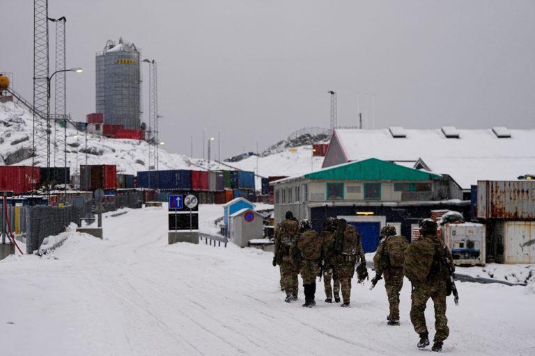 Danish soldiers disembark at the port in Nuuk