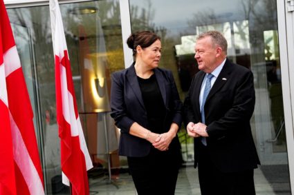 Denmark's Foreign Minister Lars Loekke Rasmussen and Greenland's Foreign Minister Vivian Motzfeldt prepare for meeting at ...