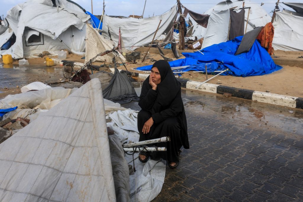 Gaza families dig through rubble searching for loved ones' remains