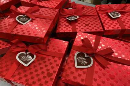 Workers process sweets at Li-Lac Chocolates in the Brooklyn borough of New York City