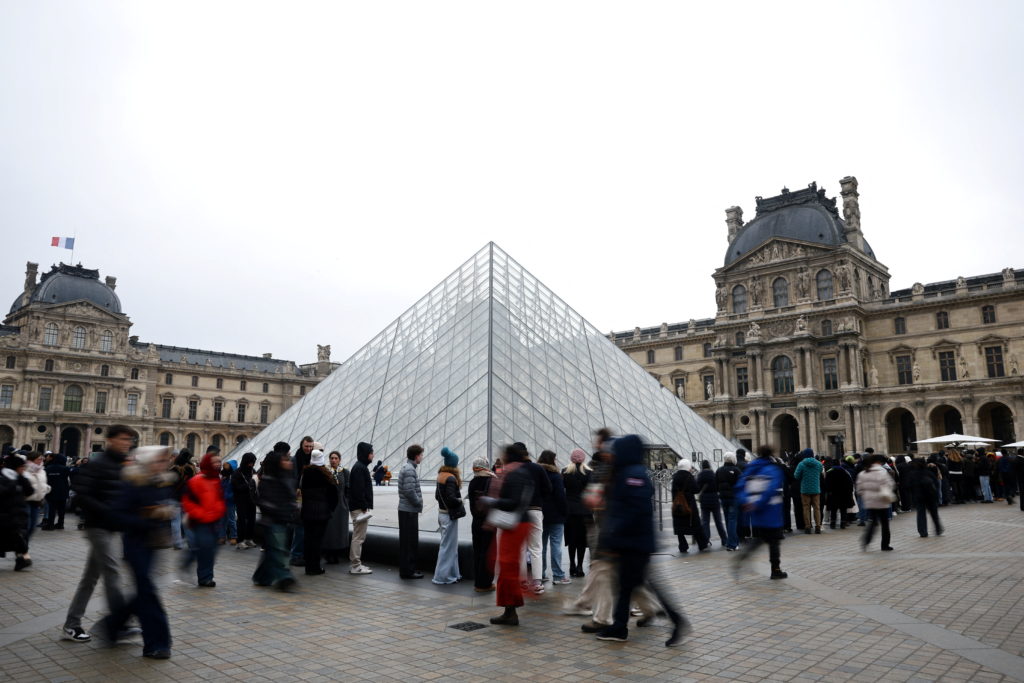 Opening at Paris Louvre museum delayed as employees discuss possible strike