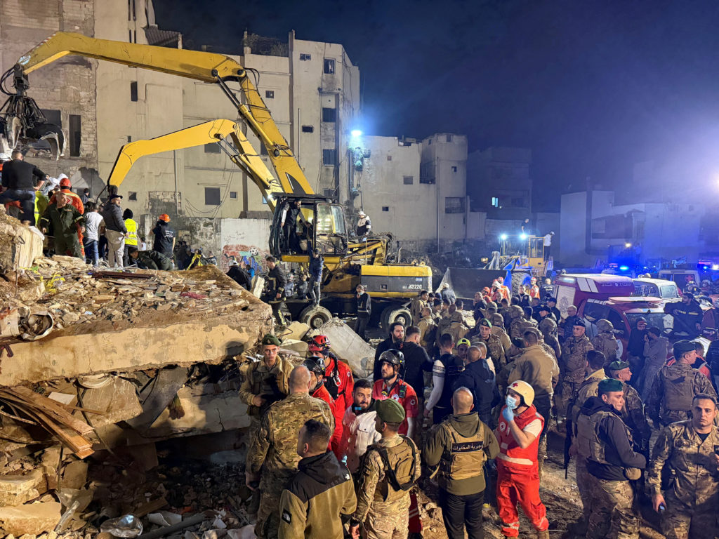 Rescue teams search for survivors in northern Lebanon building collapse that killed at least 9