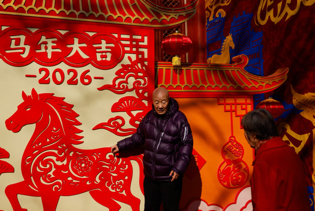 PHOTOS: Year of the Horse gallops in with Lunar New Year prayers, robots and firecrackers
