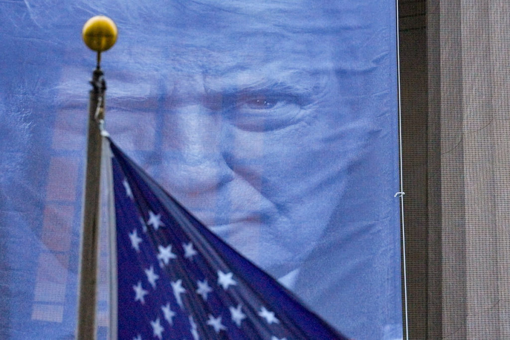 New banner depicting U.S. President Donald Trump is hung on the Department of Justice building in Washington