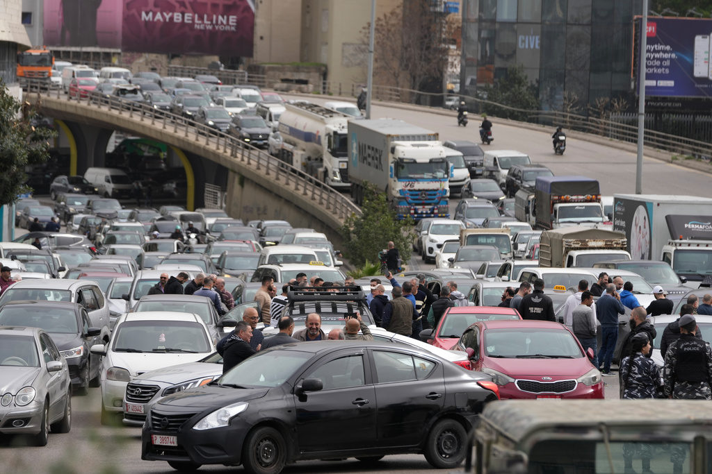 Drivers block Beirut roads in protest of new taxes that raise fuel prices