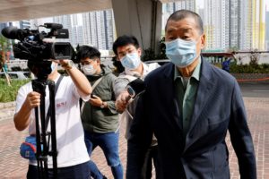 FILE PHOTO: Media mogul Jimmy Lai Chee-ying, founder of Apple Daily arrives at West Kowloon Magistrates's Courts to face c...