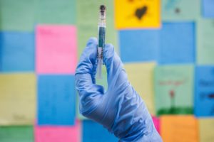 A person poses with a dose of Moderna mNEXSPIKE (COVID-19 Vaccine, mRNA) in this illustration picture taken in Schwenksville