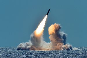 FILE PHOTO: An unarmed Trident II D5 missile is test-launched from the ballistic missile submarine USS Nebraska
