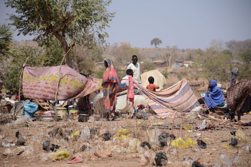 Newly arrived displaced families from Kadugli gather at Umdulu Camp, in Engpung County