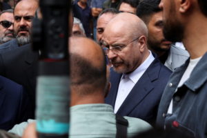 Iran's parliament speaker Mohammad Baqer Qalibaf visits a site of an Israeli strike, in Beirut
