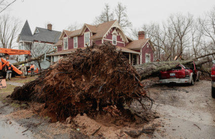 Authorities search debris after suspected tornadoes kill 6 in Michigan and Oklahoma