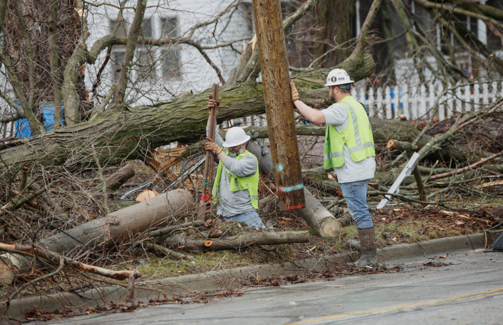 Powerful winds and extreme weather knock out power, damage property and fuel wildfires across parts of U.S.