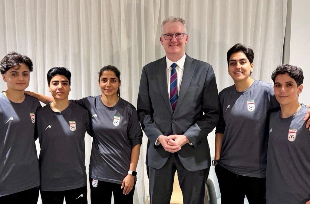 Australia's Home Affairs Minister Tony Burke grants five women from the Iranian women's soccer team humanitarian visas