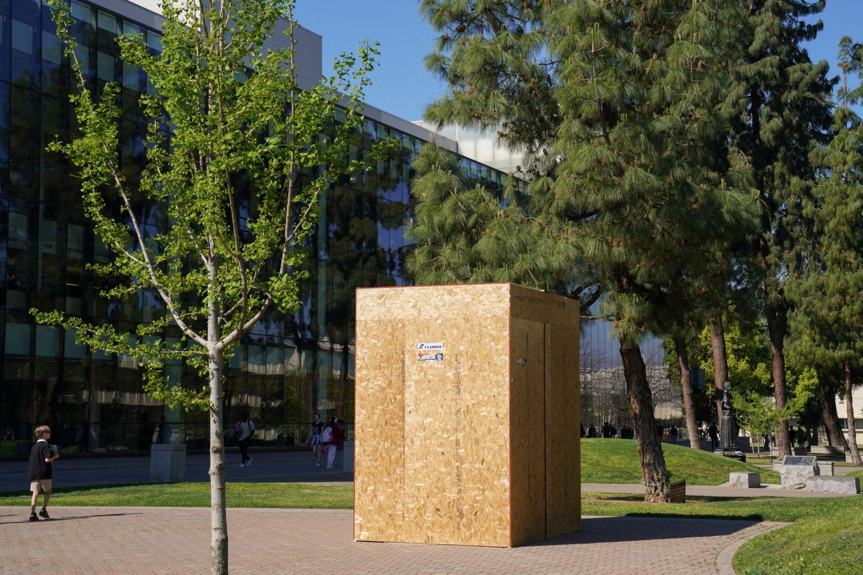 Statue of Cesar Chavez stands covered with a black sheet at Fresno State University