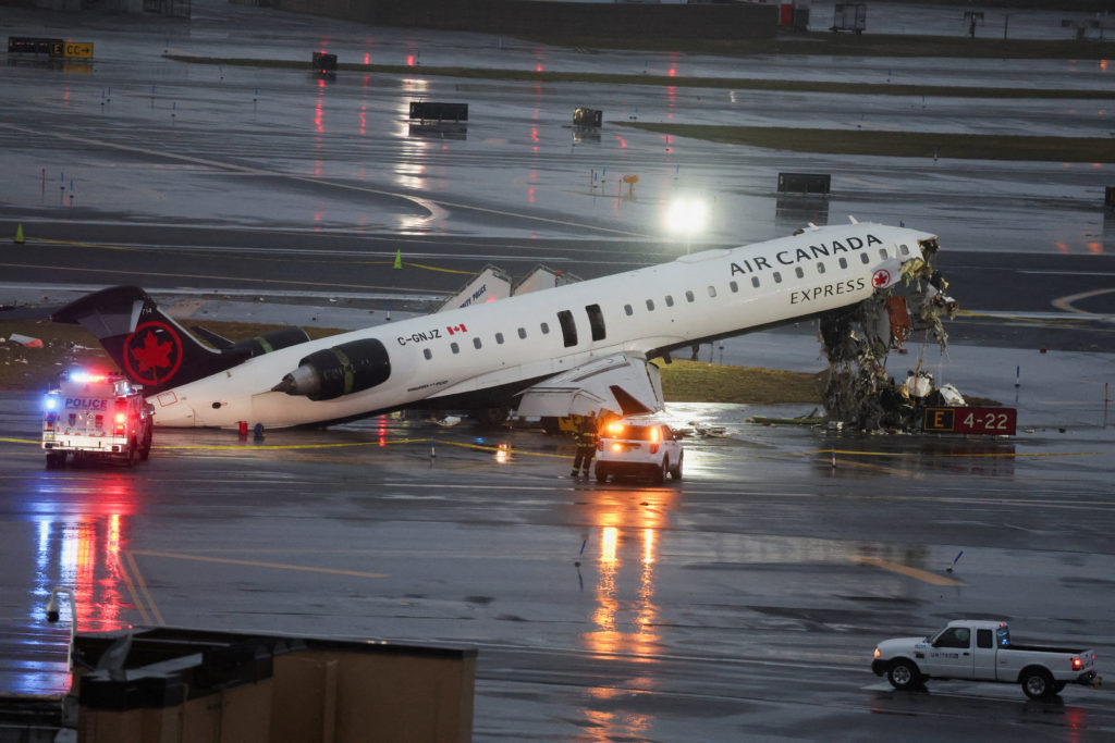 Air Canada Express jet collides with a ground vehicle at LaGuardia airport