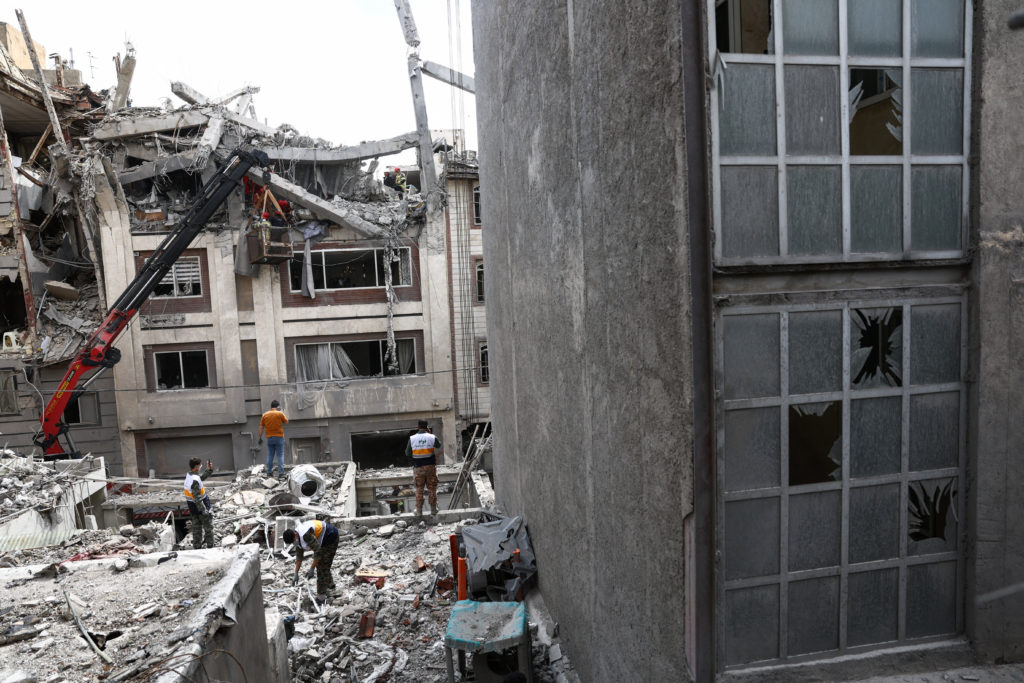 Aftermath of a strike on a residential building in Tehran