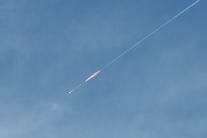 FILE PHOTO: An Iranian missile flies towards Israel, amid the U.S.-Israeli conflict with Iran, as seen from Hebron