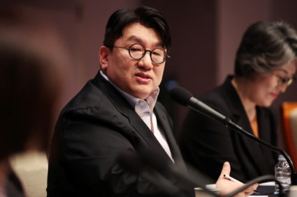 South Korean police seek to arrest K-pop mogul behind BTS over alleged fraud