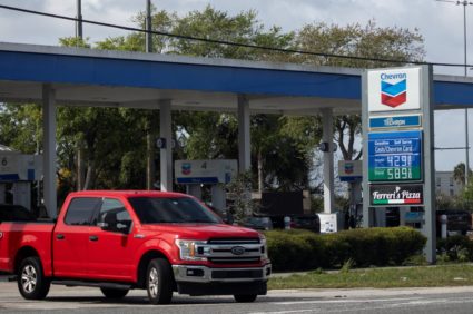 Gas prices are displayed at a gas station in Titusville