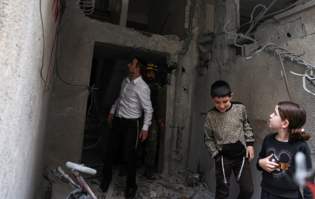 Iran fires on Israel and Gulf neighbors as Trump claims threat from Tehran nearly eliminated