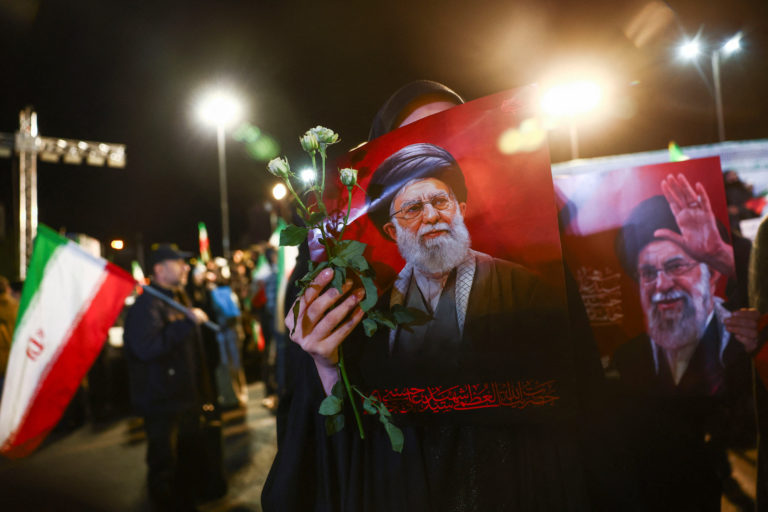 People attend a funeral ceremony for the Head of Iran's Revolutionary Guards' intelligence organisation, Majid Khademi, in...