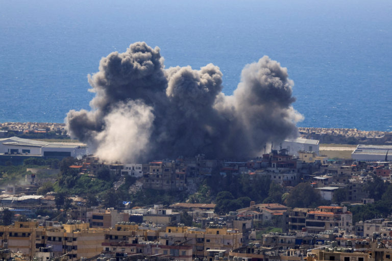 Smoke rises following an Israeli strike on the southern suburbs of Beirut
