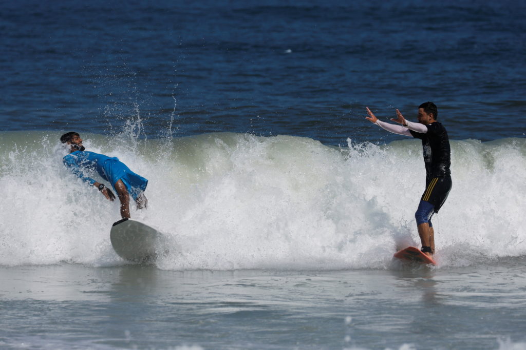 Surfers in war-torn Gaza find rare moments of joy in the waves
