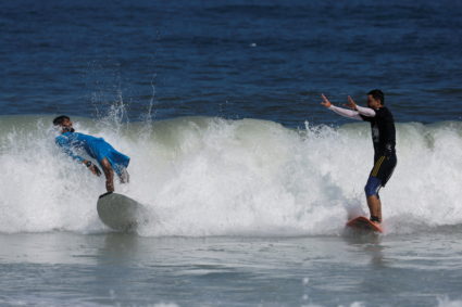 Surfers in war-torn Gaza find rare moments of joy in the waves