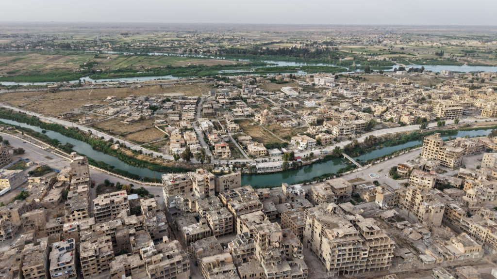 A drone view shows a general view of Deir al-Zor city and the Euphrates River