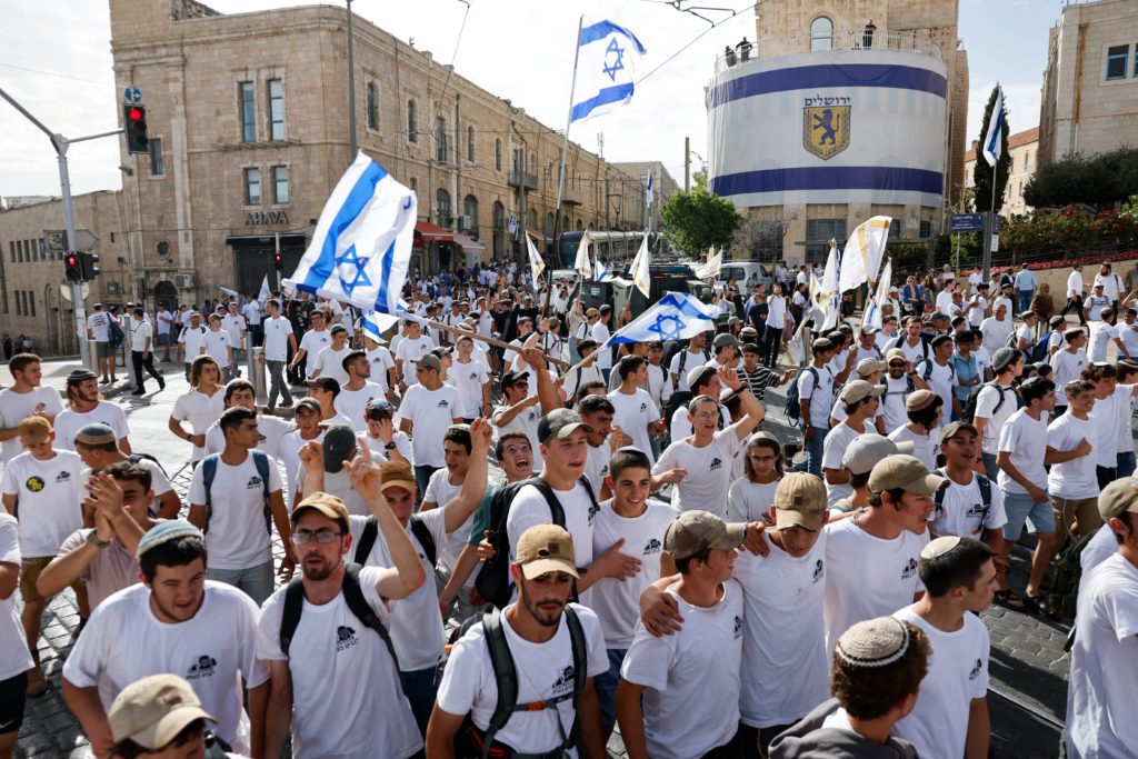 Ultranationalist Jews recite racist slogans during march into Jerusalem's Old City