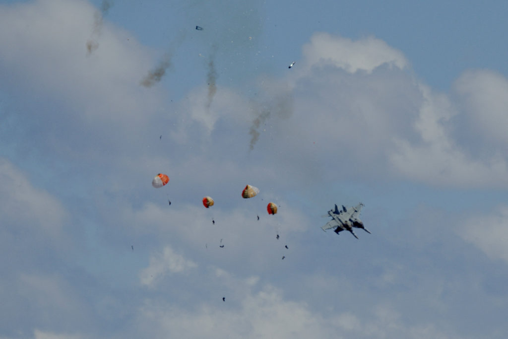 Military jets' crew members eject safely following a mid-air collision during the Idaho air show outside Mountain Home Air...