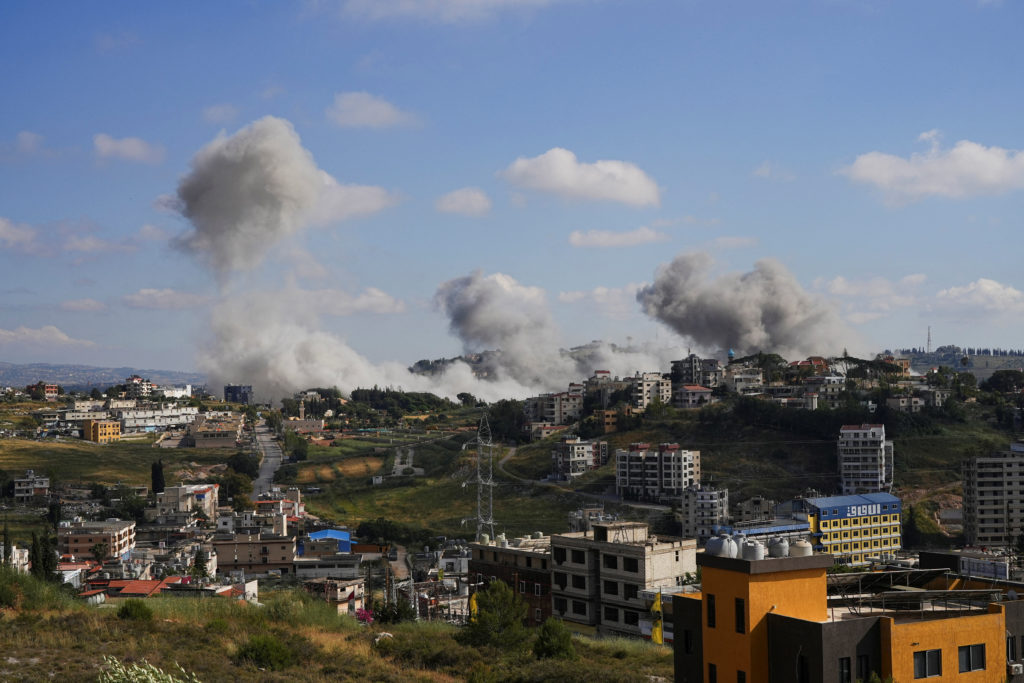 Israel's military says it's striking Hezbollah sites as Netanyahu vows to 'increase the blows'