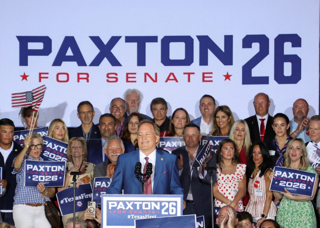 Texas Attorney General Ken Paxton speaks to supporters after winning the Republican runoff election for U.S. Senate in Tex...