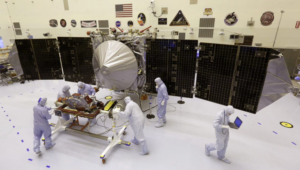 Technicians work on NASA's next Mars-bound spacecraft, the Mars Atmosphere and Volatile Evolution (MAVEN) spacecraft, as i...
