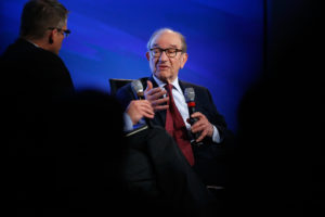 Greenspan sits for an onstage interview during the 2014 Peterson Foundation Fiscal Summit in Washington