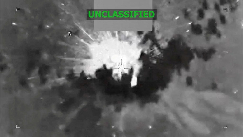 An explosion occurs on a vessel during what the U.S. military says was a kinetic strike on a suspected drug trafficking ve...