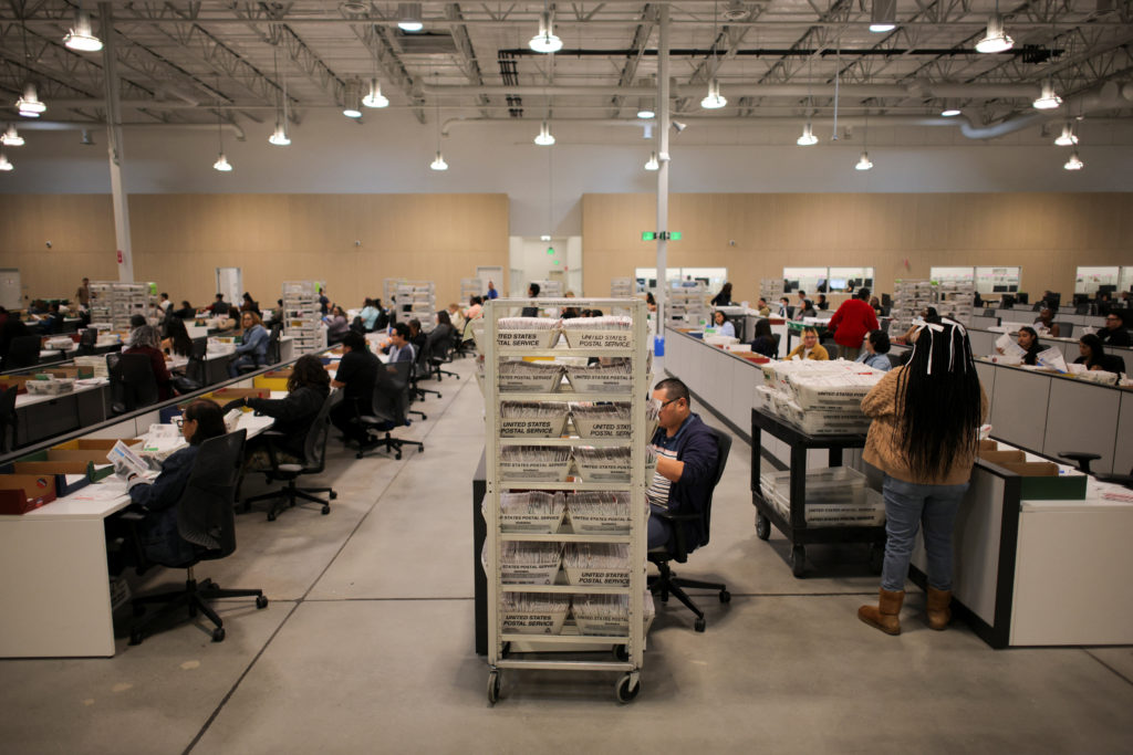 California holds crowded primary with dozens of candidates to replace Newsom