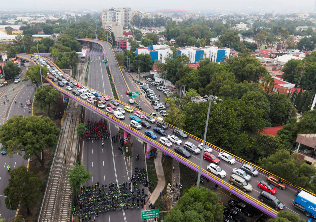 Teachers from the National Coordinator of Education (CNTE) march towards the Mexico City stadium